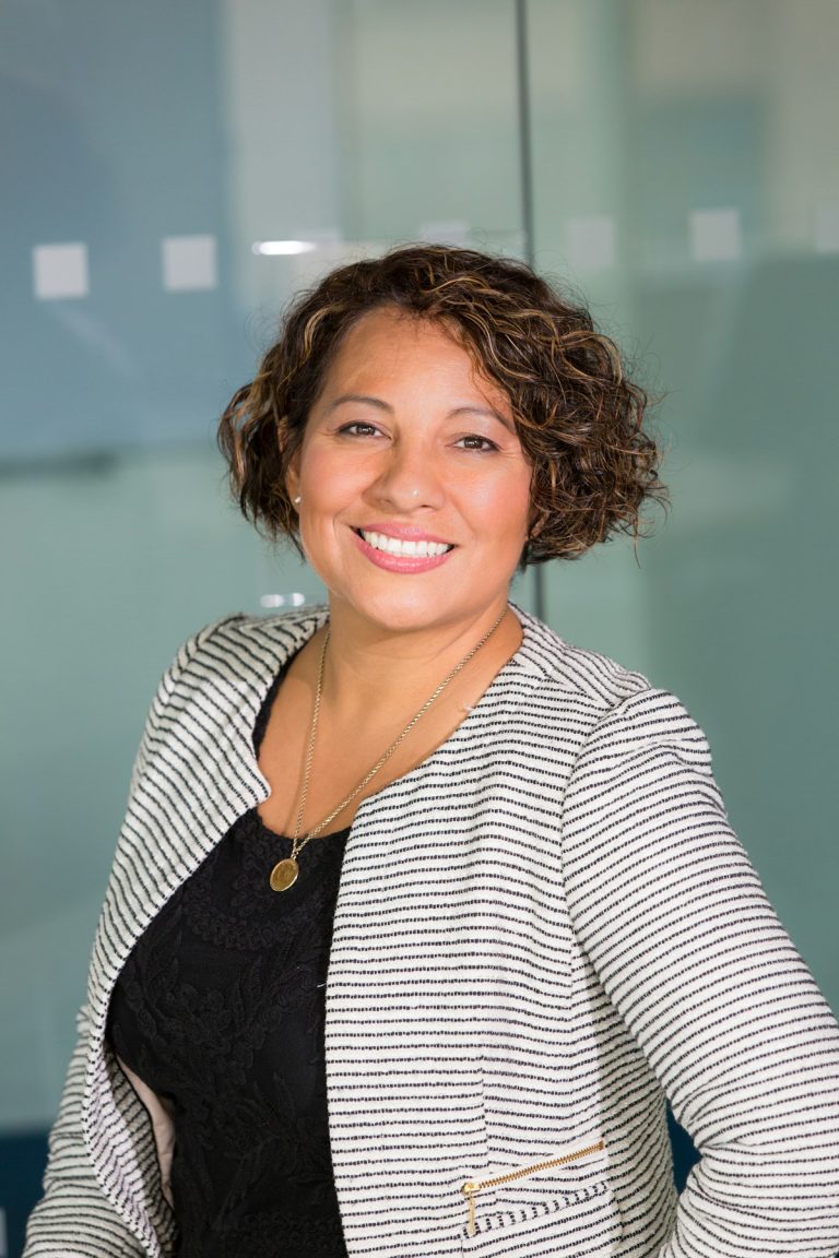 Tampa small business owner using AI automation in a modern office